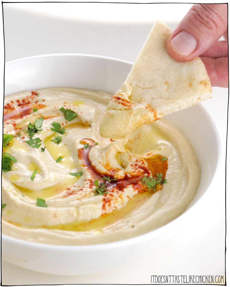 My recipe for the Best Easy Hummus! This hummus recipe is extra creamy, super delicious, oil-free, requires no peeling, and so much better than store-bought. (It's quick and easy to make too)! Learn the secret tricks and tips to make the best homemade hummus ever! #itdoesnttastelikechicken #hummus #appetizer #dip 
