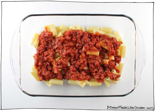 Classic Vegan Baked Ziti. This delicious pasta bake is layered with a simple homemade tomato sauce and my an easy vegan ricotta recipe. Perfect for a dinner party, special Sunday dinner, potluck, or just a night when you feel like you need to good ol’ fashioned home cooking. #itdoesnttastelikechicken