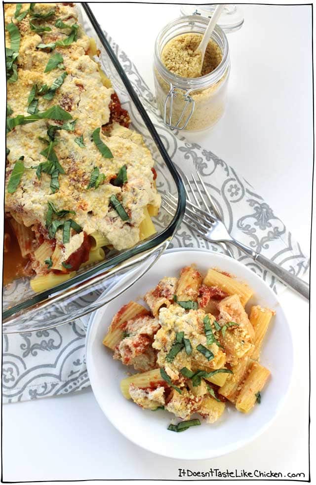 Classic Vegan Baked Ziti. This delicious pasta bake is layered with a simple homemade tomato sauce and my an easy vegan ricotta recipe. Perfect for a dinner party, special Sunday dinner, potluck, or just a night when you feel like you need to good ol’ fashioned home cooking. #itdoesnttastelikechicken