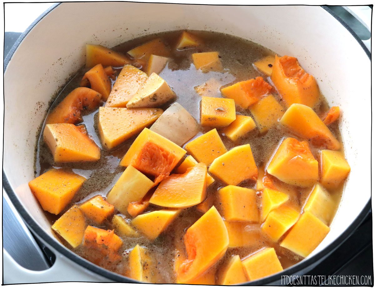 Add the butternut squash, vegetable broth, and spices and simmer. 