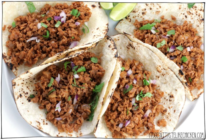 Delicious, fast, easy, cheap, and vegan! Everything about these easy TVP tacos speaks to my soul. Just 15 minutes to whip up this amazingly delicious and meaty taco filling. Top with your favorite taco toppings for a super easy dinner or lunch. YUM! #itdoesnttastelikechicken #tacos #veganrecipes