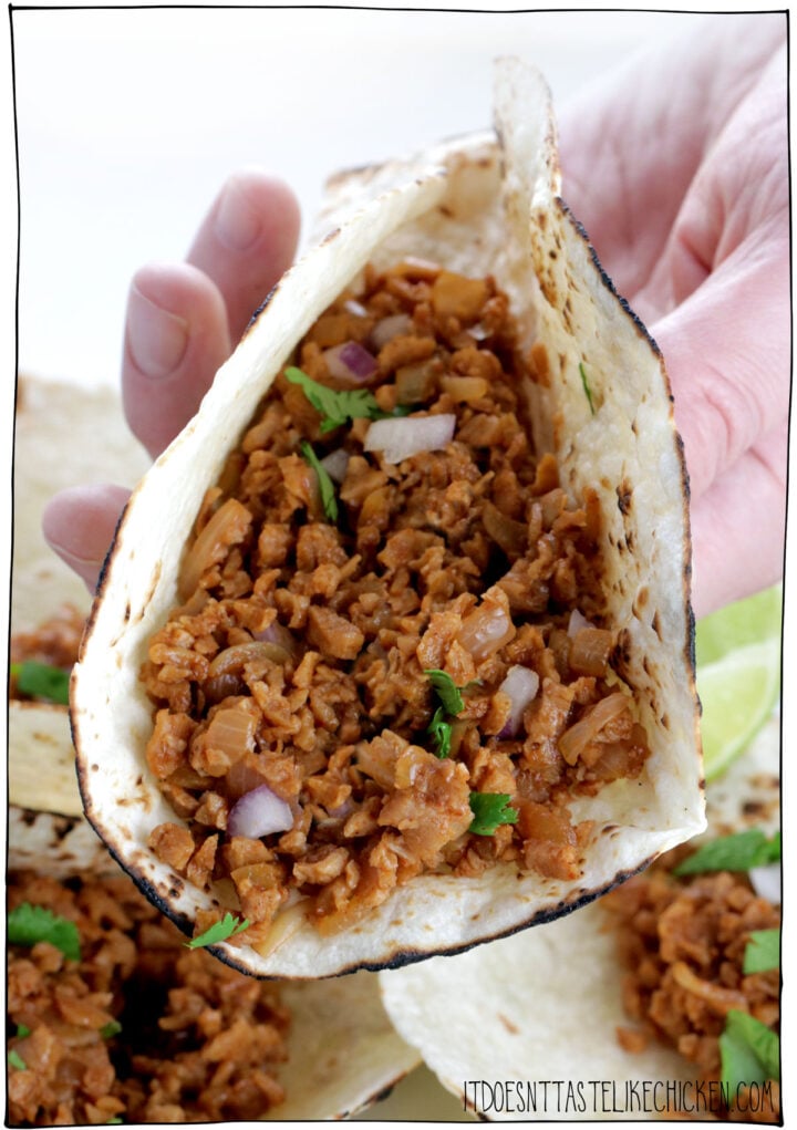 Delicious, fast, easy, cheap, and vegan! Everything about these easy TVP tacos speaks to my soul. Just 15 minutes to whip up this amazingly delicious and meaty taco filling. Top with your favorite taco toppings for a super easy dinner or lunch. YUM! #itdoesnttastelikechicken #tacos #veganrecipes
