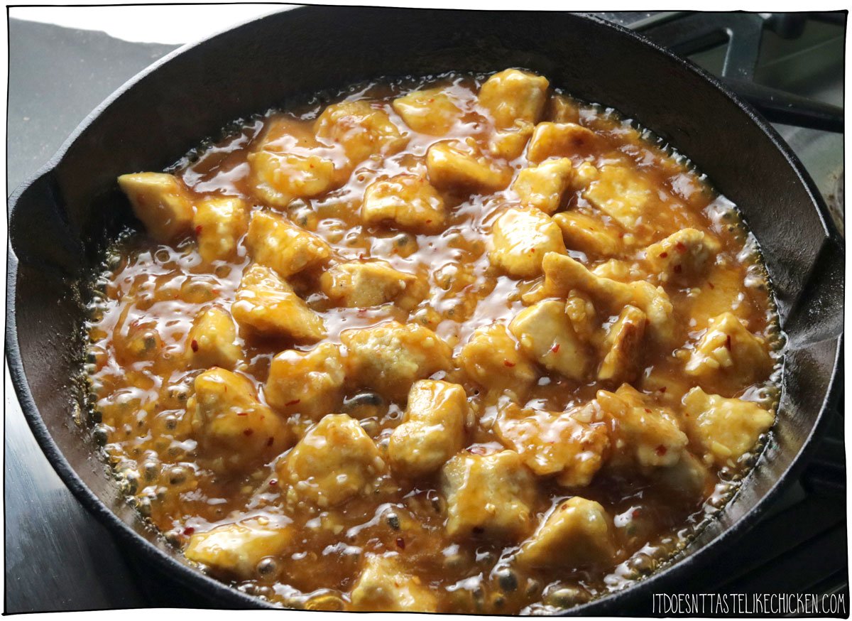 Cook for 2 - 5 minutes more until the sauce has thickened. Serve over rice with green onions and orange zest for garnish.