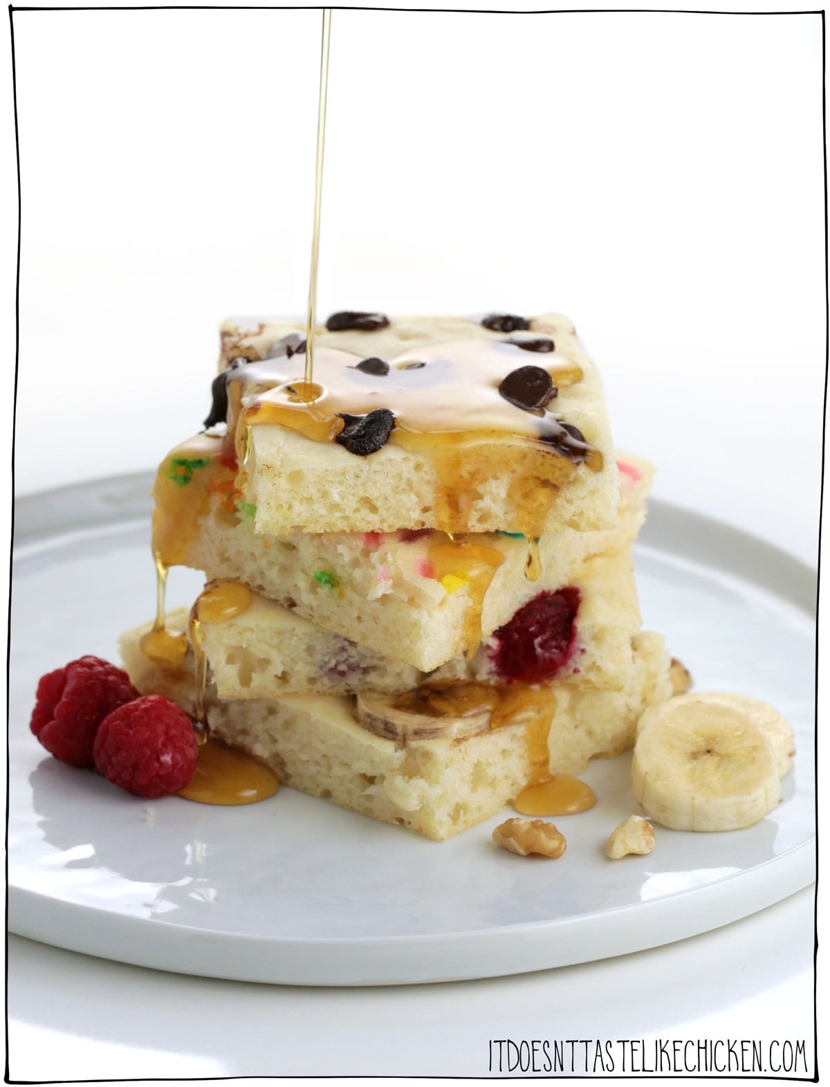 Easy Vegan Sheet Pan Pancakes! Just whip up the 8 ingredient batter made using pantry staples you likely already have on hand, spread onto a baking sheet, decorate with any toppings you like, and bake for 15 minutes. That's it! It's so simple and makes pancakes that are perfectly cooked, hot all at the same time, SUPER FLUFFY, and with endless flavour combos. #itdoesnttastelikechicken #veganrecipes #easyvegan