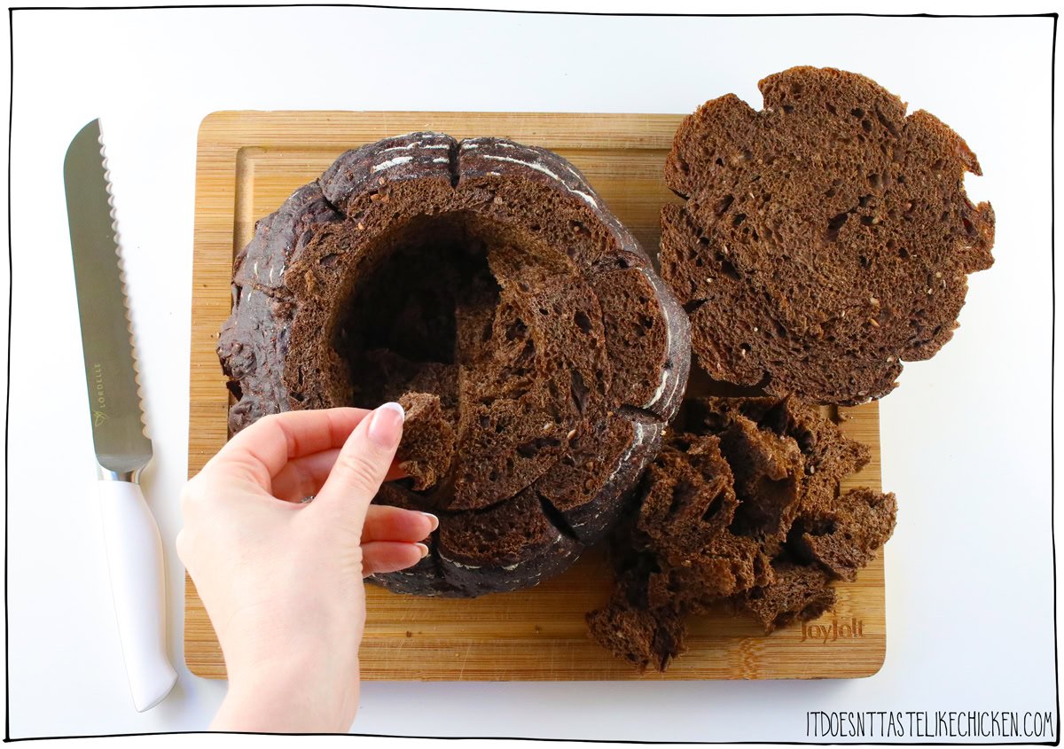 Make the bread bowl by hollowing out a pumpkernickle or sourdough loaf
