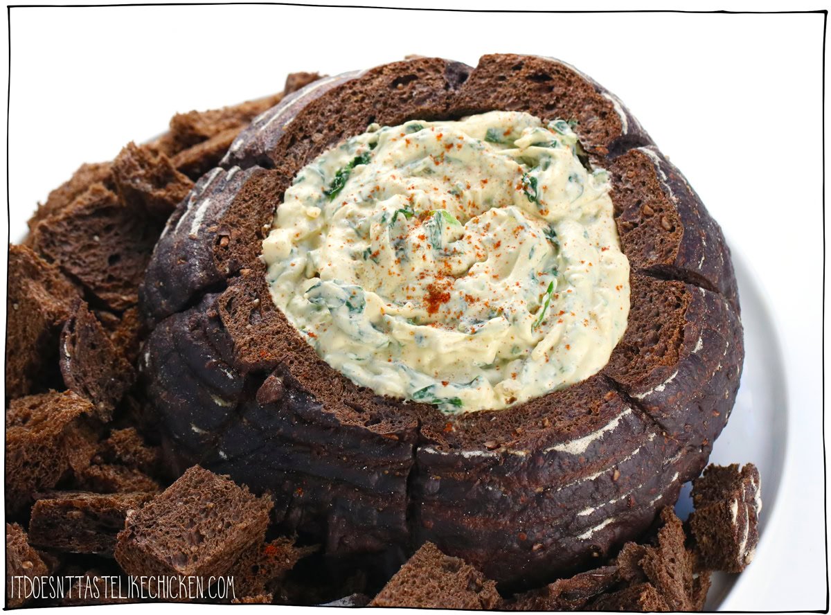 This Easy Vegan Spinach Dip is a classic crowd-pleaser, perfect for any gathering. It tastes just like the original but is entirely plant-based and gluten-free (no one will know it's vegan)! A delicious make-ahead party appetizer, it’ll have everyone coming back for more. Serve it in a pumpernickel or sourdough bread bowl, or in your favorite serving dish with bread, crackers, or veggies for dipping.