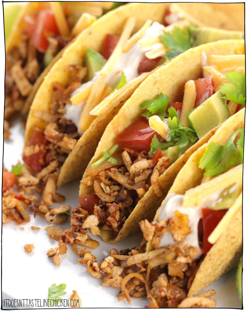 Get ready to fall in love with my new Easy Vegan Tacos made with Shredded Tofu Taco Meat! This is the BEST vegan taco meat you'll ever taste! The secret is to use a cheese grater to grate the tofu into shreds- this gives it a texture similar to pulled chicken! The tofu is then sautéd with onion, garlic, tomato, and a homemade spice blend for the best taco seasoning. Just 30 minutes to make, these shredded tofu vegan tacos are bursting with flavor in every bite. 🌮🥳