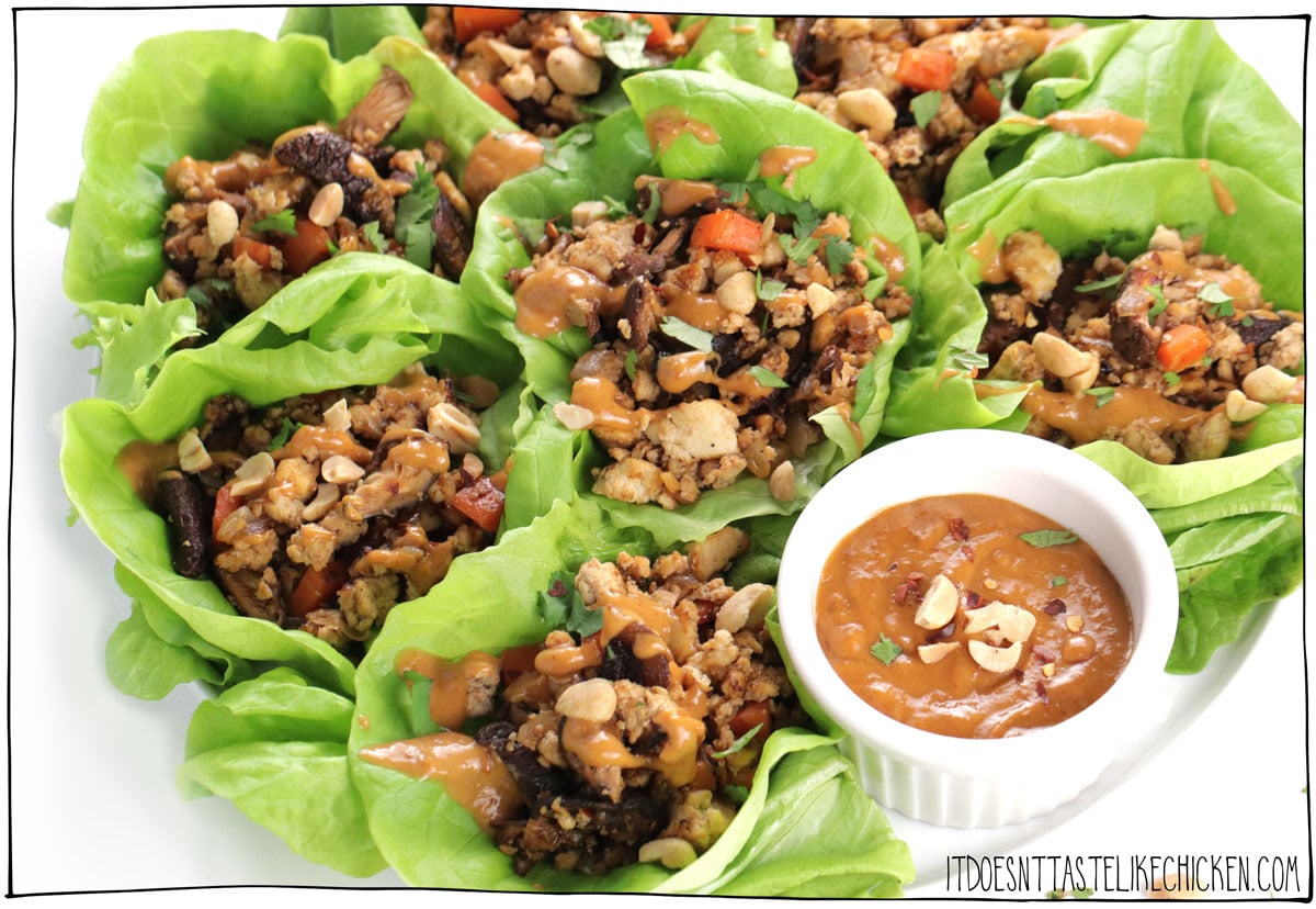 Tofu Lettuce Wraps with Peanut Sauce are a delicious and healthy meal option that everyone will love! Made with pan-fried tofu and meaty shiitake mushrooms, served on fresh lettuce leaves and drizzled with spicy peanut sauce. Yum! These tofu lettuce wraps are perfect for a quick and easy lunch or dinner and can be served as an appetizer or main course. They are also a great option for meal prep, as the filling and sauce can be made in advance and stored in the refrigerator for later. #itdoesnttastelikechicken #veganrecipes