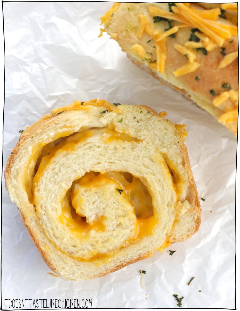Indulge in the ultimate comfort food with this Vegan Cheese Bread recipe. This homemade cheesy bread is soft and fluffy and infused with the irresistible flavors and aromas of garlic, vegan butter, and swirls of gooey vegan cheese. Perfect for snacking or serving as a side dish with your favorite soup.