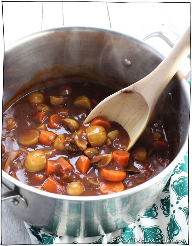 Vegan Irish Stew! Perfect for St. Patrick's Day. Hearty vegetables in a rich, earthy, thick stout beer broth. It's a stick to your ribs kinda stew! #itdoesnttastelikechicken