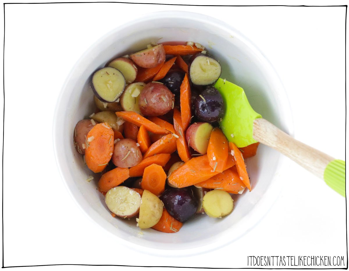 Toss the potatoes and carrots in seasoning and oil.