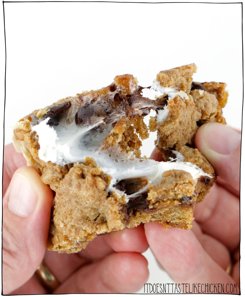 These Vegan S'mores Bars are chewy, soft, gooey, and oh-so-chocolaty! Perfect for anyone craving the nostalgic taste of s’mores without the hassle of a campfire. Get ready for your new favorite melty, chocolate-y, vegan treat that captures all the best parts of campfire nights!