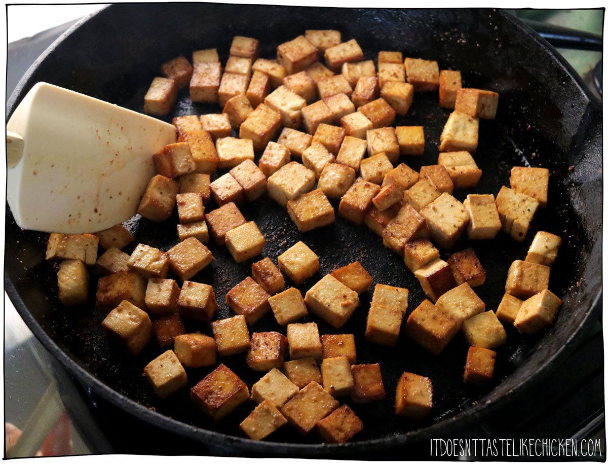 Cook the tofu cubes in a pan until browned all over.