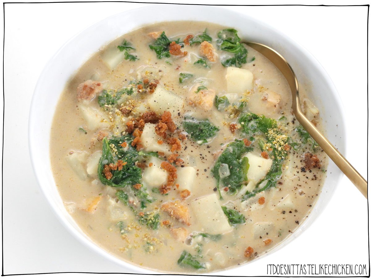 Olive Garden's Zuppa Toscana soup recipe- but veganized! Vegan Zuppa Toscana is lusciously creamy and loaded with potato, kale, and homemade tofu sausage. This soup recipe tastes like comfort food but is actually healthy, and it's easy enough to prepare for an easy weeknight dinner! #itdoesnttastelikechicken #veganrecipes #soup